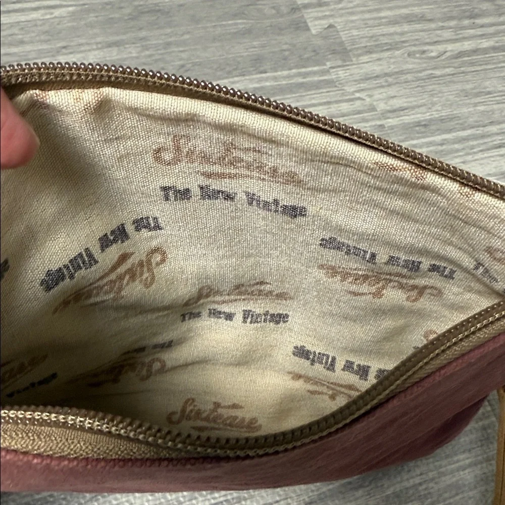 Like new Sixtease Hair On Wristlet Clutch